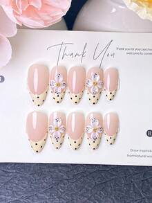 10 bucăți unghii false handmade tip press-on, unghii scurte, unghii de vară, unghii șampanie, tipsuri french galben crem cu buline, decorate cu accente 3D flori albe cu pete negre și centre aurii, perfecte pentru purtare zilnică, întâlniri și ocazii de primăvară/vară - Șampanie - Vizualizare 1