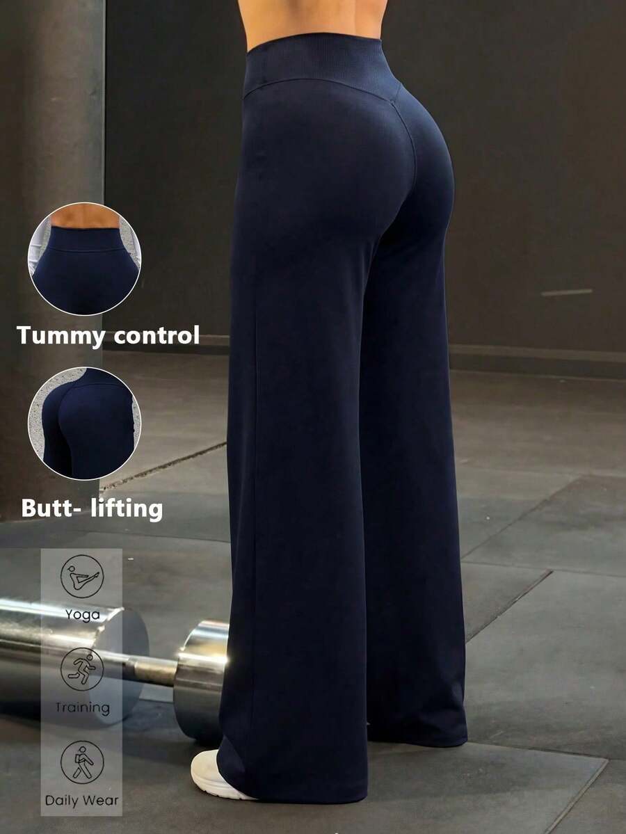 Pantalones deportivos de cintura alta minimalistas para mujer, con piernas anchas, para fitness y running. Leggings casuales cómodos, de gran elasticidad y acampanados, ideales para yoga y uso diario. Color: Negro - Azul marino - Ver 1