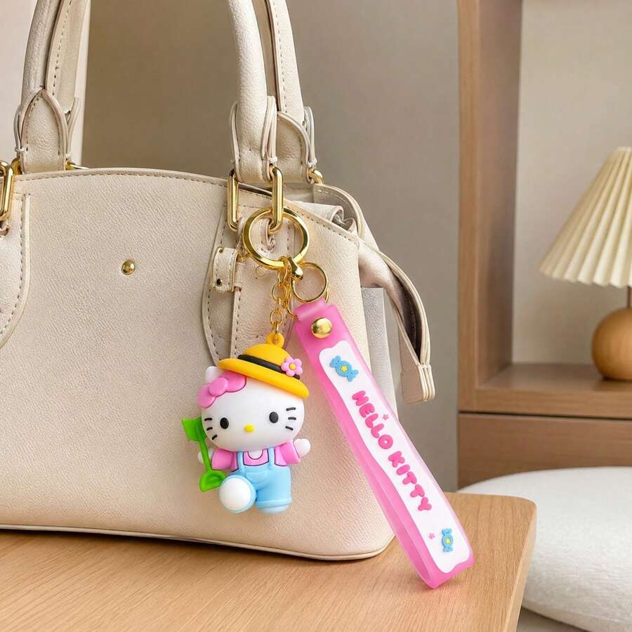 MINISO官方三麗鷗 Hello Kitty 黃色帽子藍色吊帶褲鏟子鑰匙圈 可愛3D矽膠動漫公仔 萌系粉色掛繩包飾 背包配件 車鑰匙環 畢業夏季禮物 - 粉色 - 查看 1