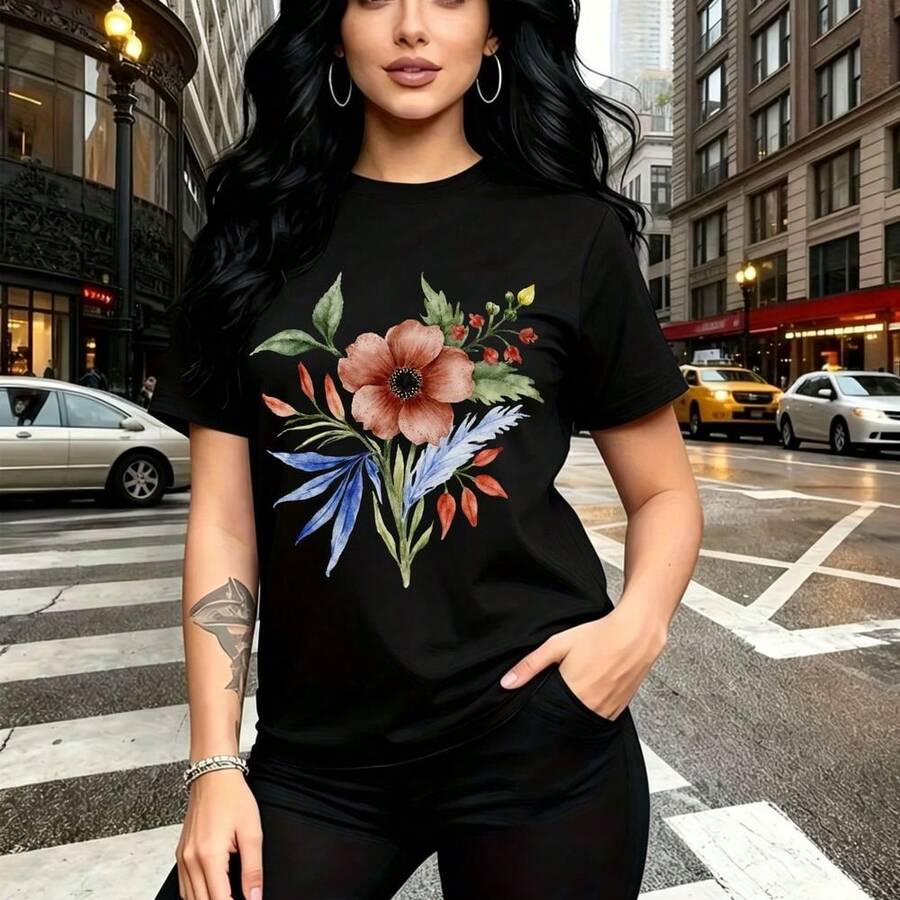 Camiseta de mujer con estampado floral colorido en rosa, azul y naranja sobre fondo negro - diseño moderno con flores y hojas verdes, ajuste casual y cómodo para uso diario - ideal para paseos urbanos, salidas con amigas y regalo perfecto para mamá, - Negro - Ver 1