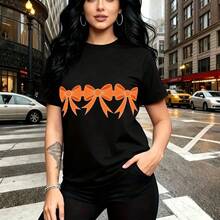 Camiseta de mujer con estampado gráfico de tres lazos naranjas vibrantes en diseño moderno y atrevido - camiseta casual de manga corta con ajuste cómodo y estilo urbano, perfecta para pasear por la ciudad o reuniones informales - regalo ideal para ma - Negro - Ver 8
