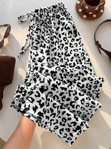 Pantalones sueltos con estampado de leopardo verde militar y cordón en la cintura para mujer - Blanco y Negro - Ver 1