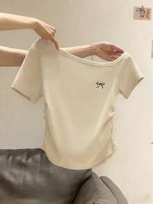 Camiseta de mujer de verano nueva, sexy, con hombros asimétricos, lazo, bordado, volantes y ajuste ceñido que deja el hombro al descubierto - Albaricoque - Ver 1