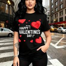 Camiseta de mujer con estampado festivo "I HAPPY VALENTINE'S DAY" y corazones rojos sobre fondo urbano - diseño casual de manga corta con ajuste cómodo y moderno, ideal para pasear por la ciudad o celebrar el amor - regalo perfecto para mamá, esposa, - Negro - Ver 1