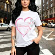 Camiseta de mujer con estampado de corazón rosa lleno de mariposas y estrellas con texto "Sobreviviente" y conciencia sobre cáncer de mama - camiseta casual de manga corta con ajuste cómodo y estilo urbano inspirador - ideal para paseos por la ciudad - Blanco - Ver 1