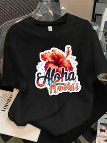 Top de mujer de cuello redondo y manga corta con un estampado floral y la palabra "Alahawai", apto para todas las estaciones. - Negro - Ver 1