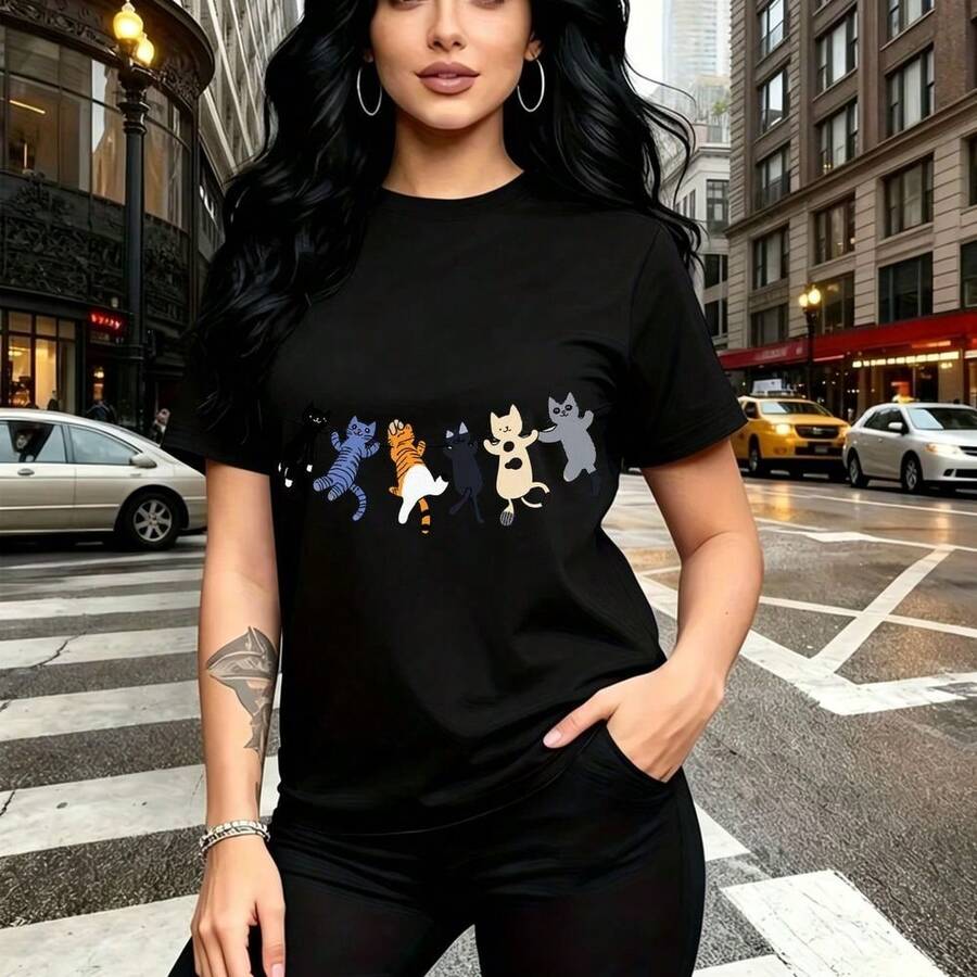 Camiseta de mujer con estampado divertido de cuatro gatos bailando en colores vibrantes - camiseta corta de manga corta con ajuste cómodo y estilo urbano, perfecta para pasear por la ciudad o ir a fiestas - regalo ideal para mamá, esposa, novia, herm - Negro - Ver 1