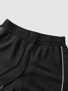 男士寬鬆街頭風休閒運動長褲，白色織帶側條紋與長抽繩腰帶，適合日常穿著 - 黑色 - 查看 5