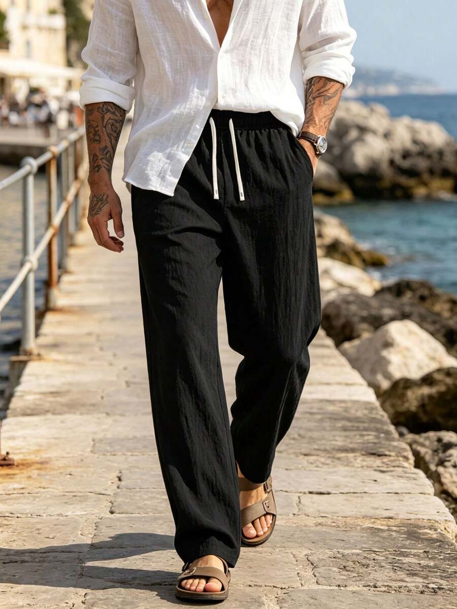 Pantalones largos casuales de lino de unicolor y estilo minimalista para hombre, pantalones rectos holgados para vacaciones en la playa y uso diario - Negro - Ver 1