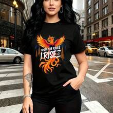 Camiseta de mujer con estampado vibrante de fénix renaciendo de las cenizas y frase "FROM THE ASHES I RISE" - diseño urbano con llamas en tonos cálidos, ajuste cómodo y estilo atrevido para el día a día - ideal para pasear por la ciudad, salidas casu - Negro - Ver 8