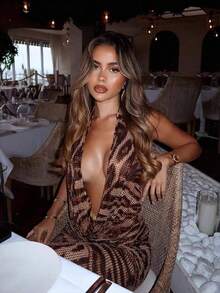 Precioso vestido largo de fiesta de corte A para mujer con bajo asimétrico con volantes, diseño sin mangas ni tirantes, tejido de punto y ligeramente elástico. - Marrón - Ver 1