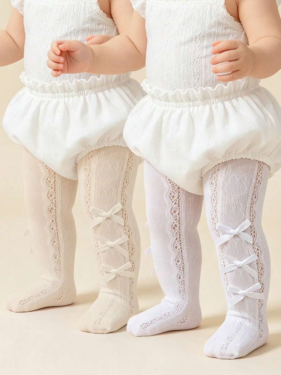2 chiếc quần tất bé gái họa tiết nơ, quần tất kiểu công chúa, quần tất ren mềm mại, thoải mái cho bé.