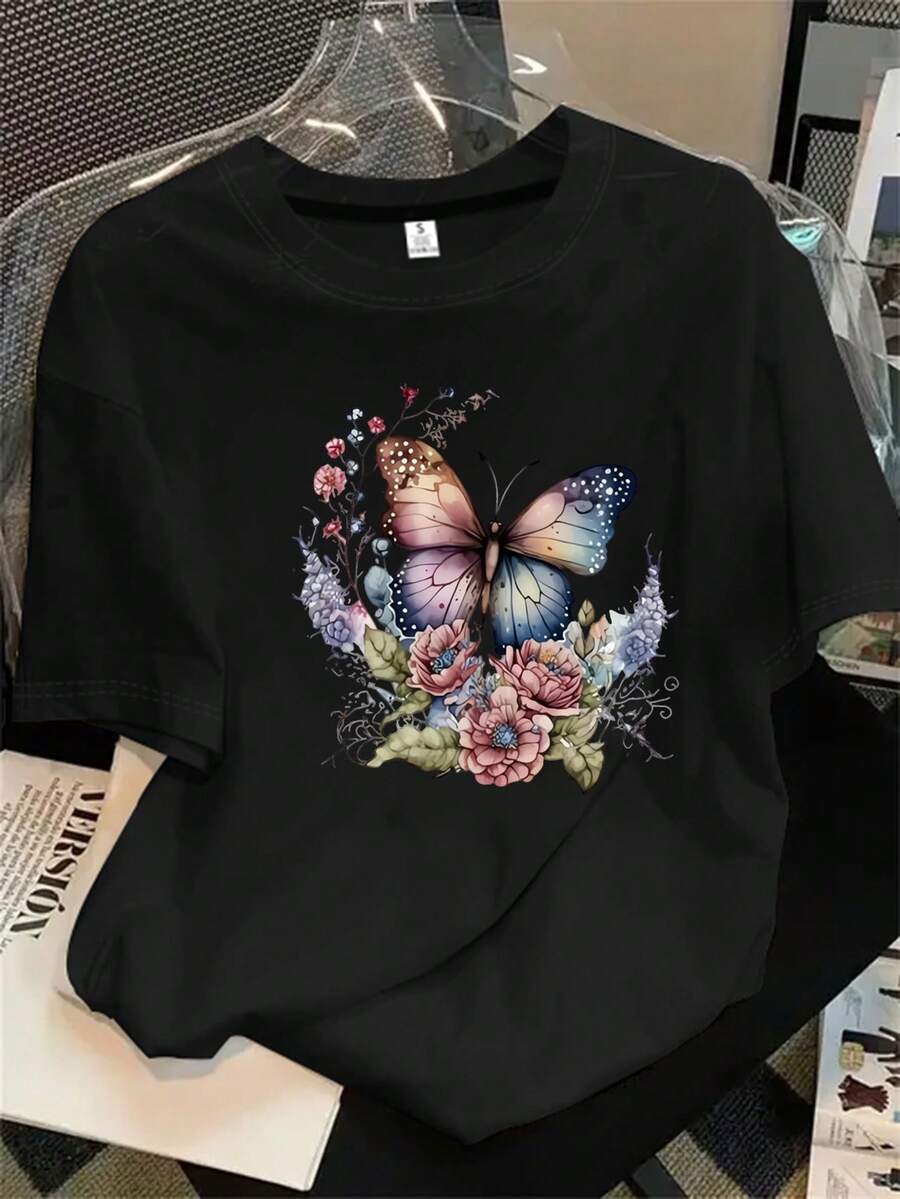 Top de mujer de manga corta y cuello redondo con estampado de mariposas y flores, ideal para todas las estaciones. - Negro - Ver 1