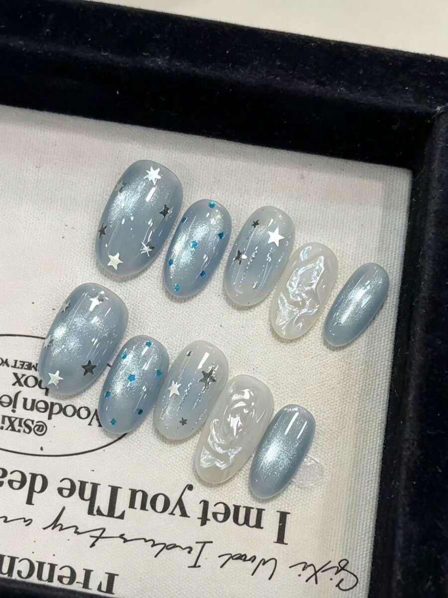 10入藍色貓眼穿戴式甲片,奢華長杏仁形假指甲,星星與3D大理石設計,手工閃亮假指甲尖,可重複使用優雅海洋主題美甲,適合女性日常與派對穿戴 - 淺藍色 - 查看 1