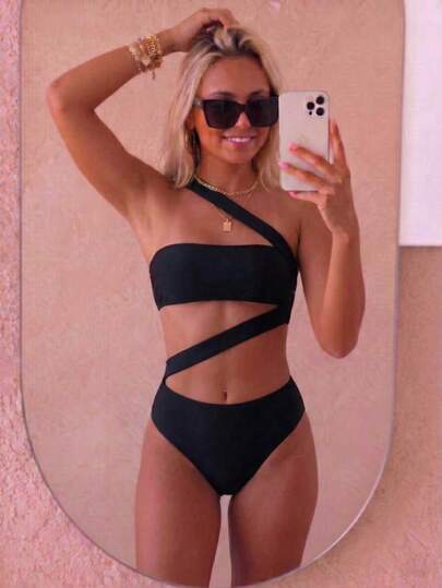 Traje de baño monokini de mujer con un hombro y diseño calado, elegante para vacaciones en la playa, color negro