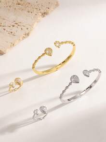 Un conjunto de joyería de lujo ligero, elegante y exquisito, chapado en oro y plata, densamente incrustado con gotas de agua del tamaño de diamantes, un conjunto de brazalete y anillo decorativo de circonita, adecuado para fiestas de gala, uso diario y regalos de vacaciones para mujeres. - Gotas de agua dobles, grandes y pequeñas - Ver 1