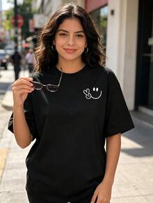 Adecuado para todas las ocasiones Informal y cómodo Nuevo modelo 2026 Camiseta de manga corta para mujer, moderna e informal, con estampado de carita sonriente.Cómoda y transpirable, es versátil e ideal para cualquier ocasión. XXF2 - Negro - Ver 2