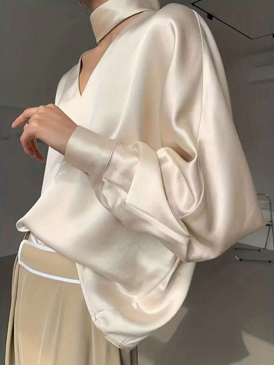 Blusa de manga larga de satén de alta gama para mujer de talla grande, con cuello drapeado para un aspecto elegante. Blusa refinada y elegante de color albaricoque. Primavera - Champán - Ver 1