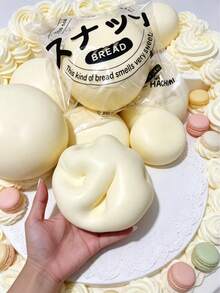 新款大號牛奶麵包壓力舒緩玩具，必備款！超柔軟且觸感滋潤，溫柔慢回彈，就像真實蓬鬆的牛奶麵包一樣。每一次擠壓都能幫助釋放挫折感並緩解日常壓力。 - 彩色 - 查看 5