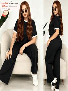 Comfort And Style In One Outfit! Upgrade Your Look With Our 2-Piece Set: A Ribbed Top And Super Comfortable Pants. Available In Various Colors. Women's 2-Piece Casual Set: Short-Sleeve Crew Neck Top And High-Waisted Loose Wide-Leg Pants - Ribbed Textured Loungewear Set For Summer And Yoga - 黑色 - 查看 1