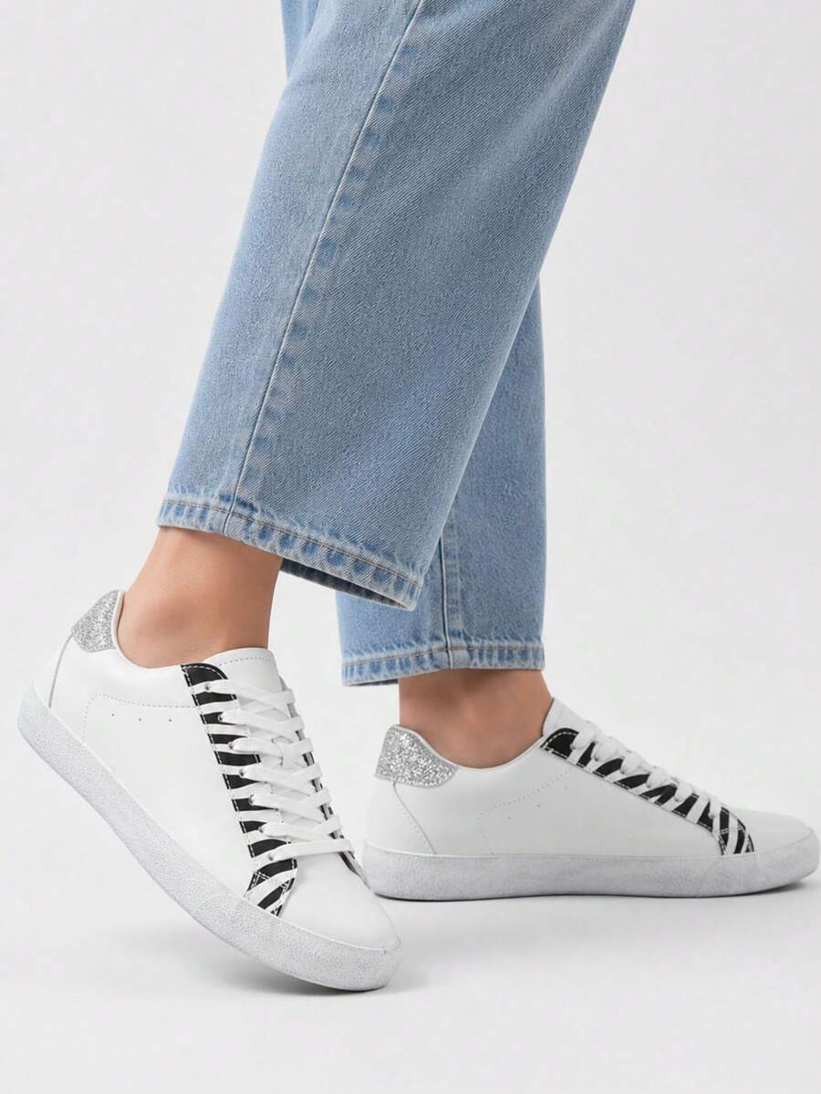 Women's Animal Print Sneakers. Sporty Style, Round Toe, Lace-Up Closure, Faux Leather, Shaded Sole, Textile Insole. - White - View 1
