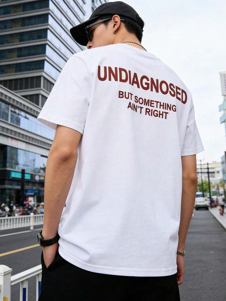 Pas diagnostiqué, mais quelque chose semble amalache. T-shirt à manches courtes pour homme, style décontracté, vêtement pour homme en pur coton. Tenue d'été pour hommes. - Blanc - Voir 1