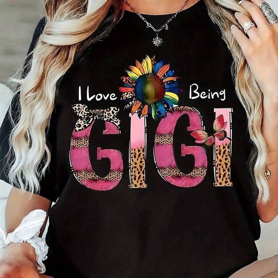 Camiseta negra holgada con la frase "I Love Being Gigi" y estampado de girasoles y leopardo colorido para uso casual, Juneteenth, uso diario, estilo minimalista, suavidad agradable para la piel, corte unisex, estilo vintage, transpirable y cómoda. - Negro - Ver 1