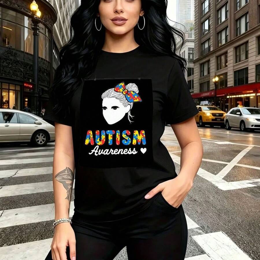 Camiseta de mujer con estampado de conciencia sobre el autismo, diseño con rostro femenino y piezas de rompecabezas coloridas - camiseta casual de manga corta, ajuste cómodo y moderno, estilo urbano con mensaje inclusivo - ideal para la Semana Santa, - Negro - Ver 1