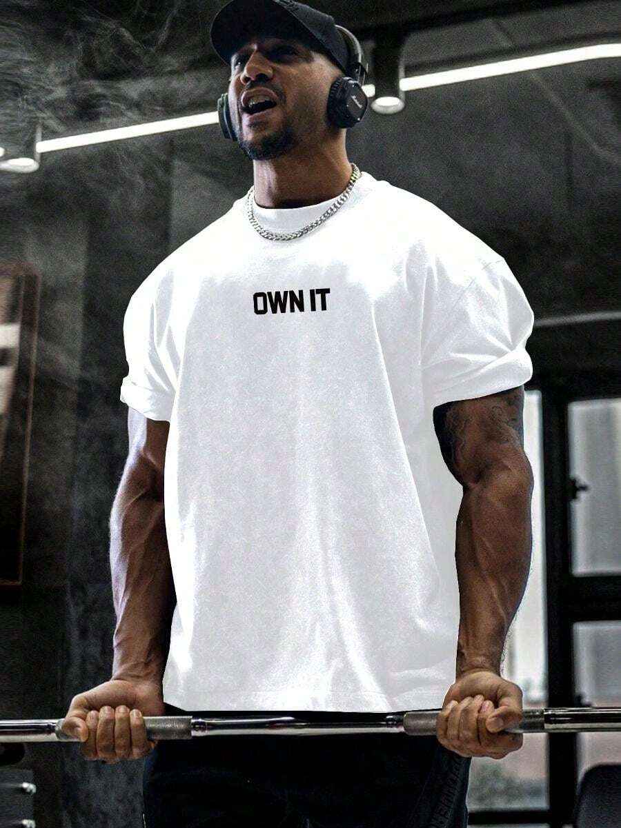 Camiseta de manga corta con cuello redondo y estampado de letras casual para hombre, tops deportivos blancos de primavera verano - Blanco - Ver 1