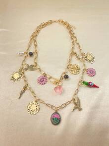 Retro Y2K Layered Necklace. Its Paperclip Chains In Gold And Silver Tones Are Adorned With Pendants Of Sunflowers, Hearts, Little Birds And Flowers. This Mixed-Style Piece Is Perfect For Summer Getaways And Daily Street Looks. - Multi-layered Floral Chili Pepper Necklace - View 8