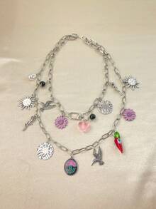 Retro Y2K Layered Necklace. Its Paperclip Chains In Gold And Silver Tones Are Adorned With Pendants Of Sunflowers, Hearts, Little Birds And Flowers. This Mixed-Style Piece Is Perfect For Summer Getaways And Daily Street Looks. - Multi-layered Floral Chili Pepper Necklace - View 7