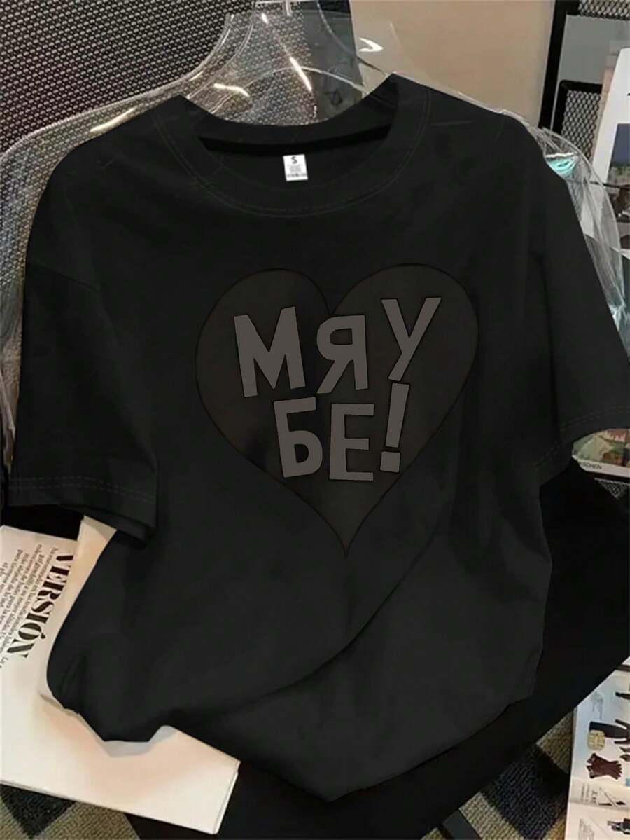 Top de mujer de cuello redondo y manga corta con el centro negro y la palabra "Vrm" impresa, apto para todas las estaciones. - Negro - Ver 1