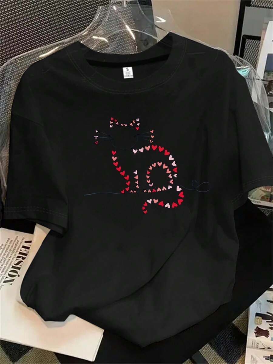 Top de mujer de manga corta y cuello redondo con estampado de corazones, apto para todas las estaciones. - Negro - Ver 1