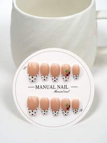 JUTI Bộ 10 miếng dán móng tay thủ công, móng giả ngắn hình hạnh nhân, thiết kế thời trang bao gồm họa tiết quả anh đào dễ thương vẽ tay, chấm bi đen và đầu móng kiểu Pháp màu trắng trên nền nude, tạo nên bộ móng cao cấp, phù hợp cho phụ nữ và bé gái sử dụng hàng ngày, kèm theo bộ dụng cụ làm móng và phụ kiện. - Nhiều màu - Xem 8
