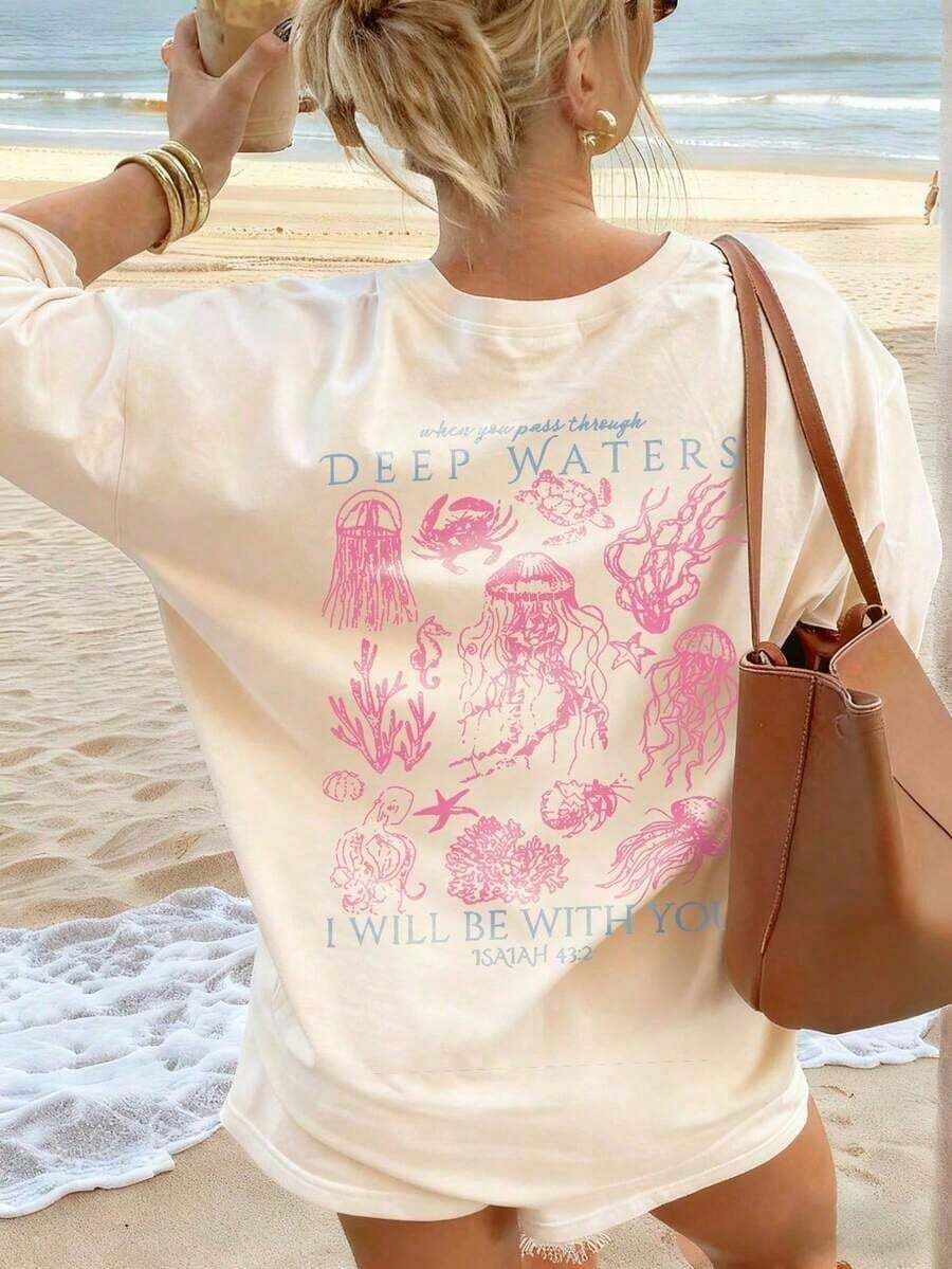 Ny sommar 2026 avslappnad lös passform T-shirt för kvinnor, med tryck av djuphavsdjur och text, bekväm och andningsbar, avslappnad amerikansk vintagestil, kortärmad, lämplig för stranden, vardagskläder och helgavkoppling. 2026-sommarkläder för kvinnor - Aprikos - Visa 1