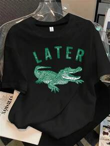 Jersey de mujer de manga corta y cuello redondo con estampado de cocodrilo y letras, apto para todas las estaciones. - Negro - Ver 1