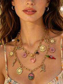 Retro Y2K Layered Necklace. Its Paperclip Chains In Gold And Silver Tones Are Adorned With Pendants Of Sunflowers, Hearts, Little Birds And Flowers. This Mixed-Style Piece Is Perfect For Summer Getaways And Daily Street Looks. - Multi-layered Floral Chili Pepper Necklace - View 3