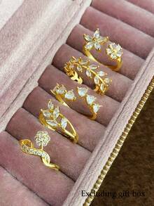Juego de 5 anillos de mujer de aleación de cobre con incrustaciones de circonita cúbica en forma de hoja y flor, de lujo, exquisitos y ajustables, abiertos, para fiesta, reunión, vacaciones y baile (caja de regalo no incluida) - Amarillo Oro - Ver 10