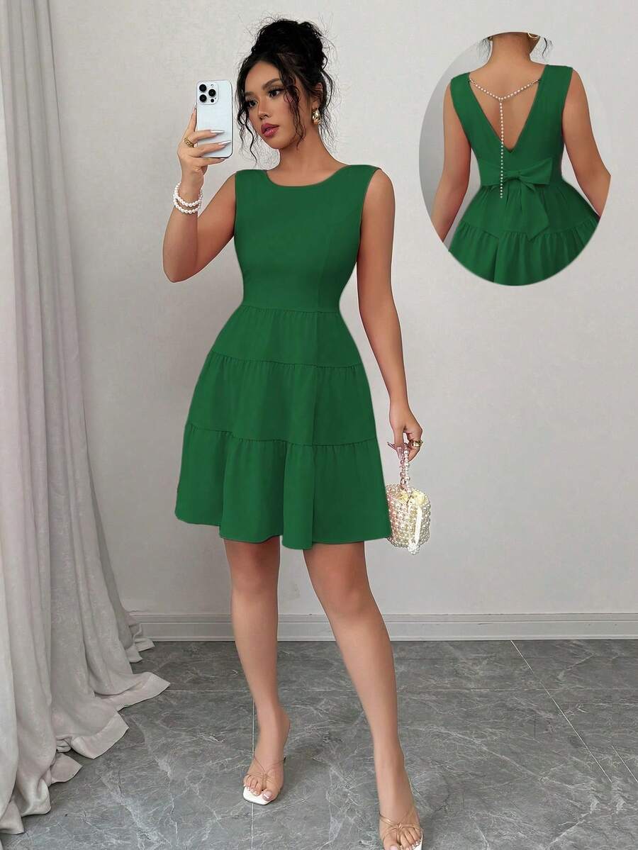 Vestido corto para mujer con cuello redondo liso, sin mangas y diseño de lazo en la espalda - verde claro - Ver 1