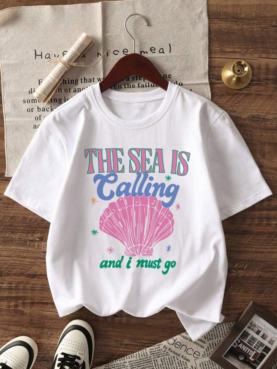 Minimalist. 100% Cotton. 1pa. Women's Casual Short-Sleeved Round Neck T-Shirt, Pink Shell Letter Print, Versatile And Beach Vacation Essential. Women's Graphic Tee. Spring/Summer Top.