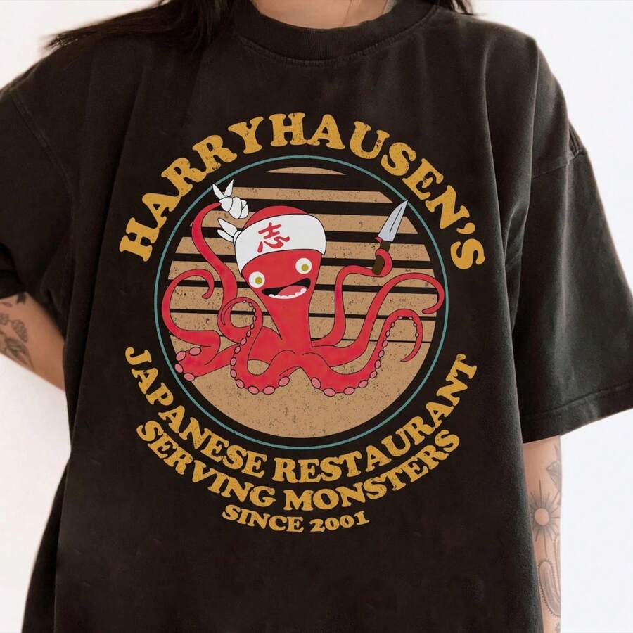 mia r del restaurante onés Chef Harryhausen's con diseño de pulpo, mia a juego para la familia de land, mia uni para adultos y niños para vies a world.. - Negro - Ver 1