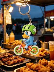 Bluey Themed 2D Cycling Adventure Keychain, Featuring The Beloved Blue Dog Riding A Colorful Bike With A Green Star Helmet. Made Of Durable, Smooth-Finish PVC With Vibrant, Non-Fading Details, It Comes With A Sturdy Metal Keyring - Multiple Styles - View 6