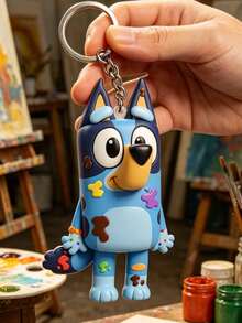 Bluey 主題藝術噴漆 2D 鑰匙圈，以標誌性的藍色狗狗角色搭配鮮豔噴漆裝飾。由光滑耐用的 PVC 製成，色彩濃郁不褪色，適合該劇粉絲的獨特主題派對贈品。 - 多款 - 查看 10