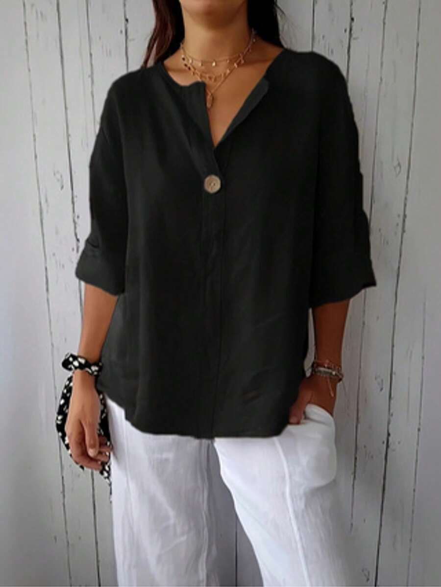 Blusa de tejido con cuello en pico y detalles de botones, corte relajado para primavera - Negro - Ver 1