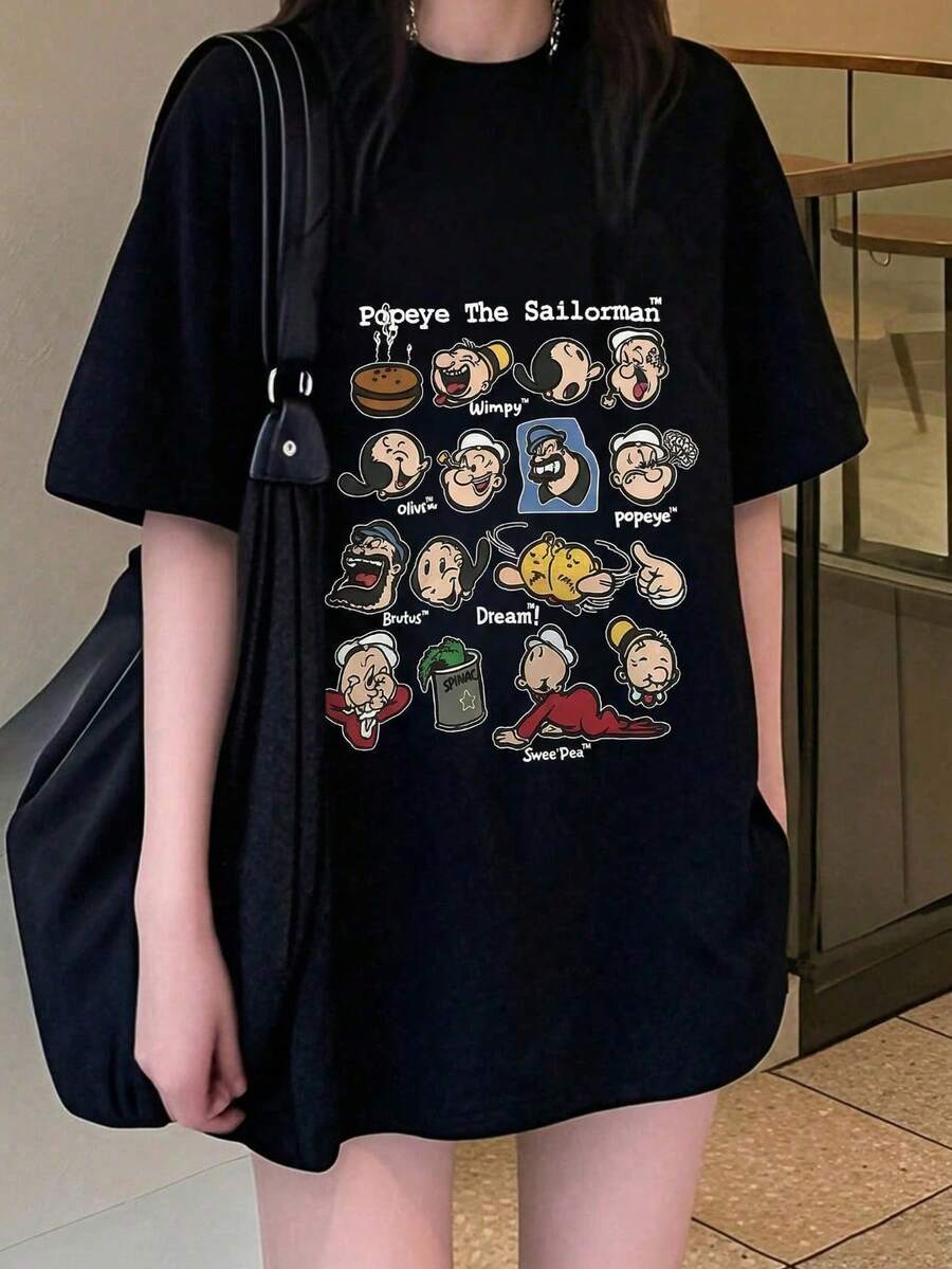 Nueva camiseta de manga corta presenta un estampado retro de dibujos animados, un estilo único y un corte holgado, lo que la hace perfecta para un look casual de verano. (Camiseta de mujer) Nuevo modelo 2026 Recomendado por mucha gente Look ganador BSJD - Negro - Ver 1