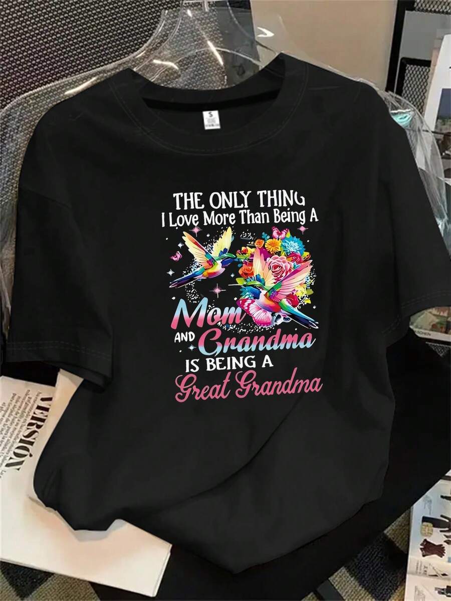 Top de mujer de manga corta y cuello redondo con estampado de pájaros en las alas, apto para todas las estaciones. - Negro - Ver 1