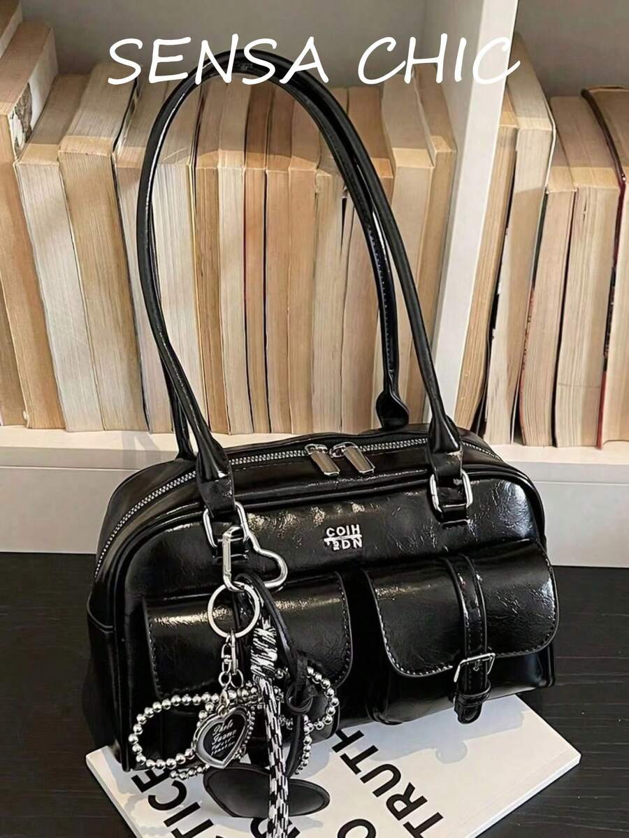 This Is A Fashionable And High-End All-Black Shoulder Bag, Featuring Letter Decoration And An External Black Heart-Shaped Pendant Design. The Handbag Has Multiple Pockets And Multi-Functional Compartments, Using Smooth Zippers For Closure, And A Dual-Handle Top That Allows For Shoulder Or Hand Carrying. It Is Very Suitable For Ladies To Use When Going Out, Shopping, Or On Dates.
