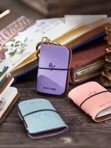 1 pieza Llavero colgante de mini cuaderno de cuero PU suave, serie de impresión, cuaderno pequeño portátil - Multicolor - Ver 5