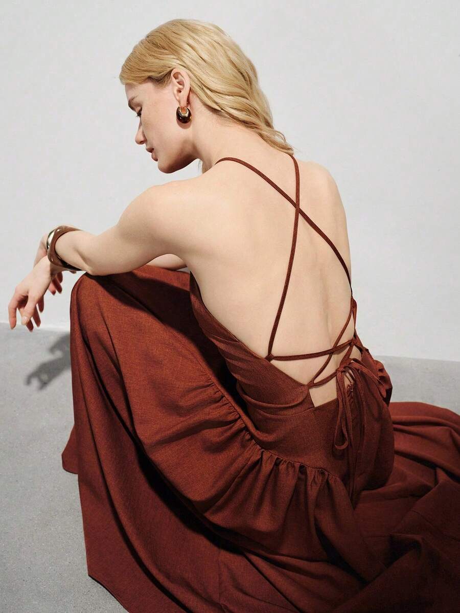 xheAveloria Modichic Vestido casual de estilo vintage color caramelo, diseño de tirantes finos, detalles de cintura alta con pliegues, falda maxi acampanada de corte relajado, mezcla de lino, piel amigable, adecuado para salidas diarias, citas de café, vacaciones de verano, exposiciones de arte y ocio de fin de semana, que muestra elegancia natural y comodidad. Vestido retro francés sin espalda con tirantes anudados, sin mangas, cintura ceñida y falda sobredimensionada.xhe - Naranja - Ver 1