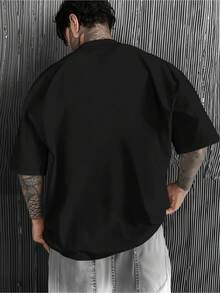 Minimalistisk. 100 % bomull. 1pac herr tyngdlyftnings-T-shirt "One More Set" - Lös passformad gymtröja med fitnesstryck, andningsbar sommarträningströja, lämplig för träning, gym och vardagsbruk, rund halsringning, designad för tyngdlyftare och kroppsbyggare. Vår-/sommartopp. - Svart - Visa 2